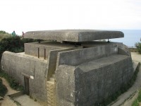 1280px-Command_post_of_Longues_sur_Mer_battery_side.jpg